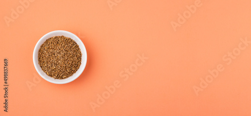 Pimpinella anisum - Anise seed condiment in a ceramic bowl photo