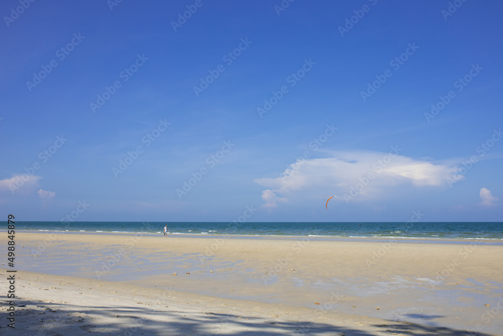 Obraz premium The Turquoise colored sand blue sky on sunny day and space on the sky