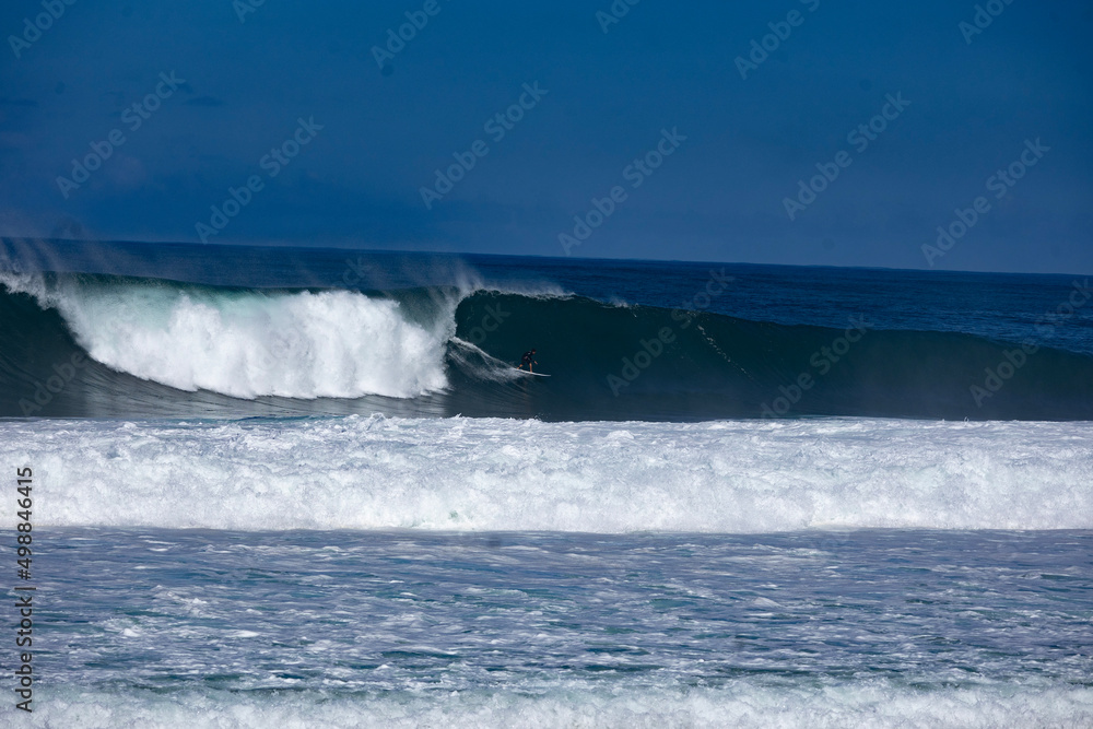 wave crashing on rocks