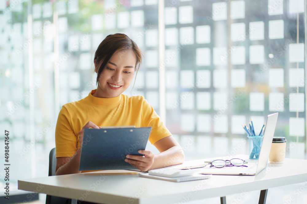Business woman or accountant or banker audit and analysis with financial costs wisely and carefully, investment and saving concept. Business woman or accountant or banker audit and analysis with financial costs wisely and carefully, investment and saving concept.