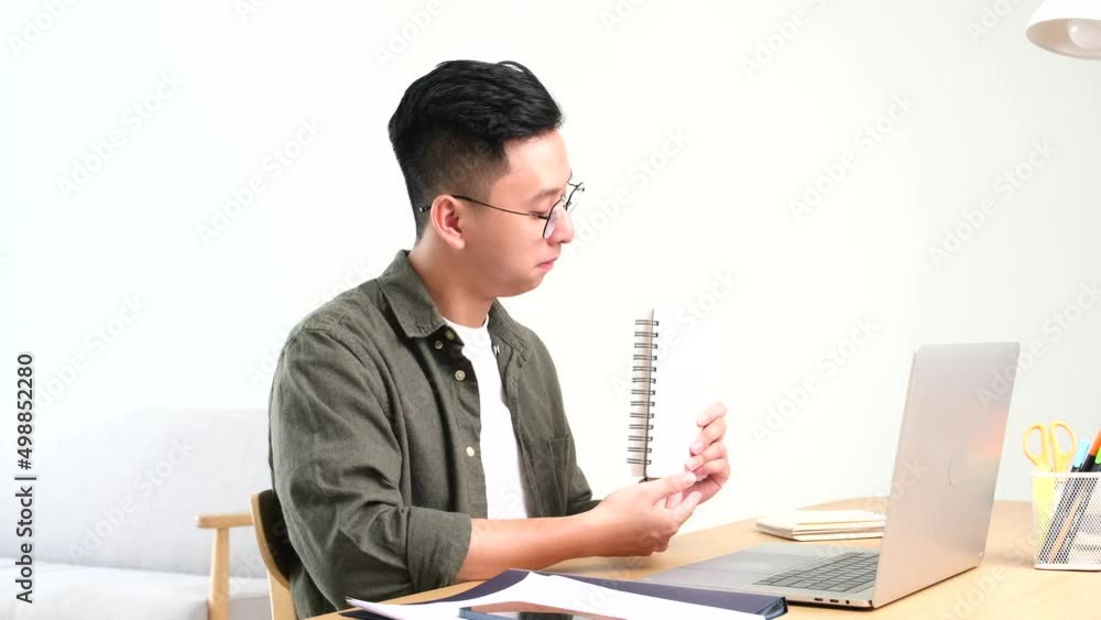 A moment of man working with laptop at home for office advertising A moment of man working with laptop at home for office advertising