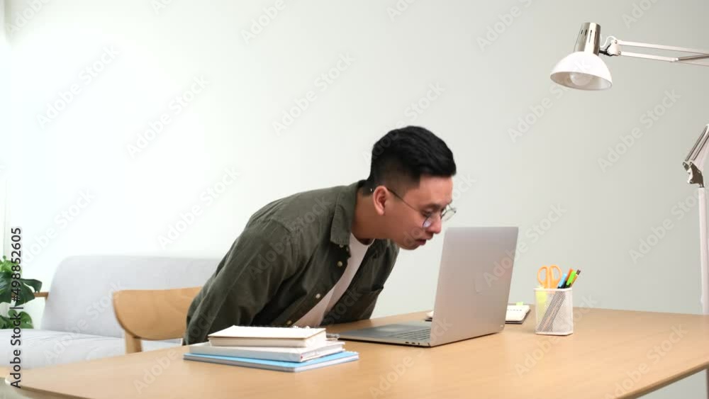 A moment of starting work with laptop at home in the morning A moment of starting work with laptop at home in the morning