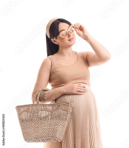 Stylish pregnant young woma...