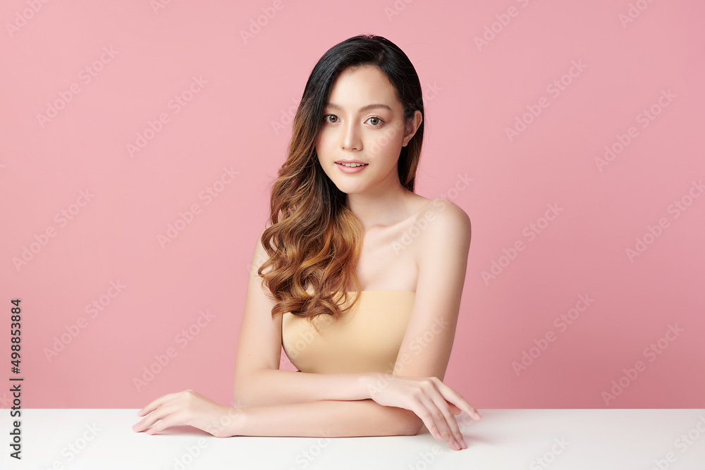 Beautiful young asian woman with clean fresh skin on pink background, Face care, Facial treatment, Cosmetology, beauty and spa, Asian women portrait. Beautiful young asian woman with clean fresh skin on pink background, Face care, Facial treatment, Cosmetology, beauty and spa, Asian women portrait.