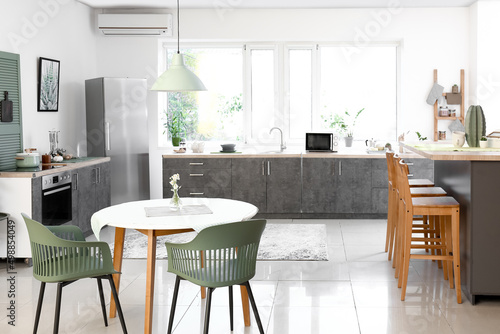 Dining table with chairs in...