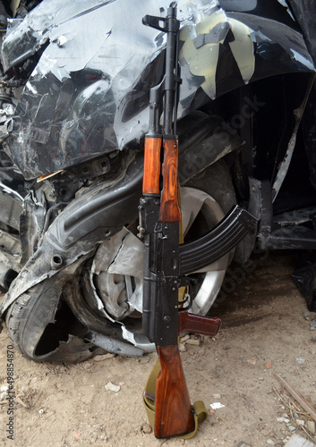 Assault rifle and car wreck in Kiev