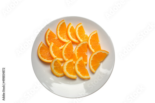 Orange slices macro on a white plate