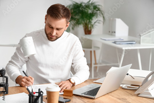 Male notary public working ...