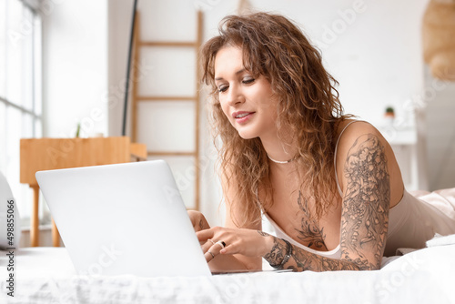 Beautiful tattooed woman wi...