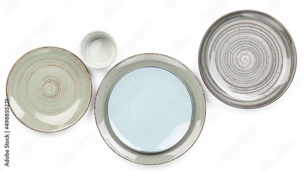 Set of stylish dinnerware on white background Set of stylish dinnerware on white background