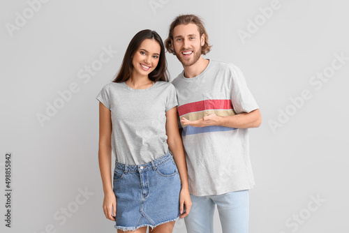 Young couple in stylish t-s...