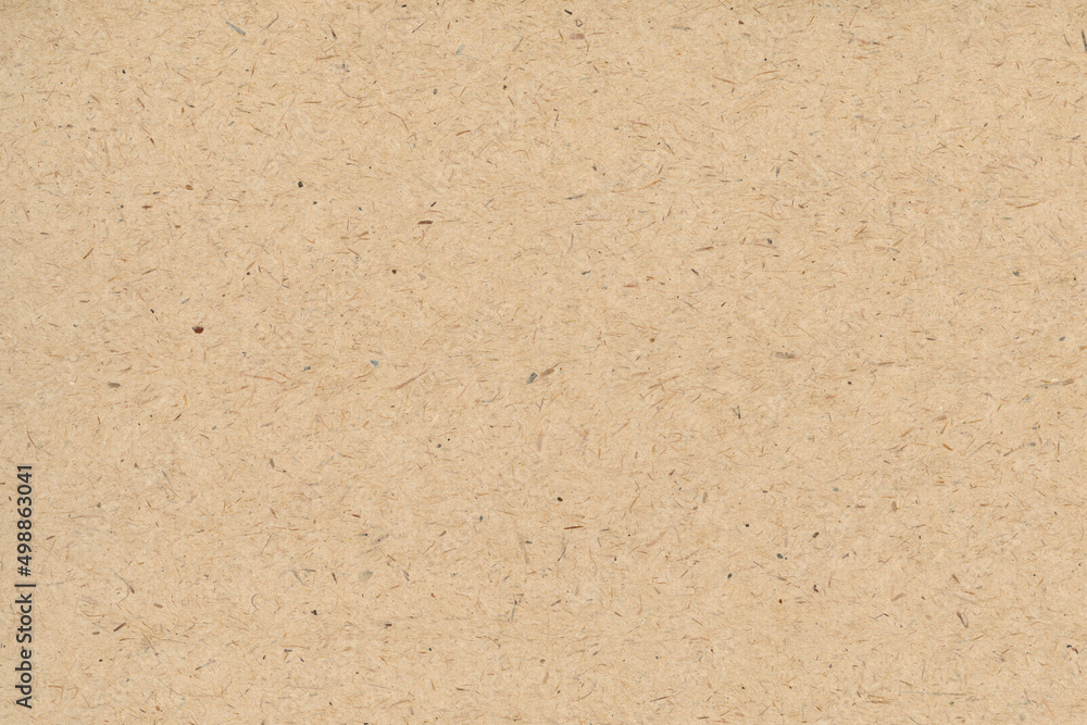 Fototapeta premium Light brown cardboard texture. Cardboard wallpaper in high resolusion. Paper background for desing