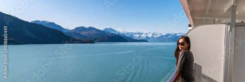 Alaska Glacier bay cruise ship travel tourist looking at icebergs inside passage from balcony deck view Scenic cruising vacation destination panoramic banner