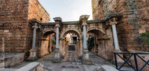 Welcome to amazing Antalya concept. Collage of famous landmarks: Hadrian's Gate old town Kaleici district and Konyaalti beach in popular resort city Antalya, Turkey photo