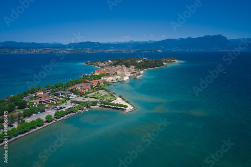 Sirmione, Lake Garda, Italy. Aerial view of the Sirmione peninsula. In the background the mountains of Lake Garda