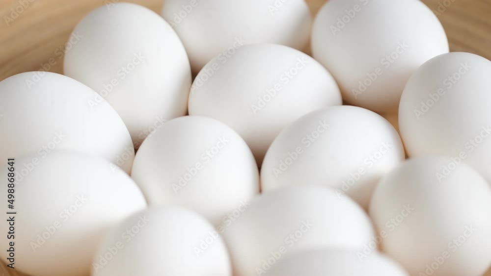Chicken egg, rotation shot, Chicken fresh raw eggs.Healthy fresh food ingredients for breakfast. Animal products. Grocery. Chicken farm fresh eggs Chicken egg, rotation shot, Chicken fresh raw eggs.Healthy fresh food ingredients for breakfast. Animal products. Grocery. Chicken farm fresh eggs