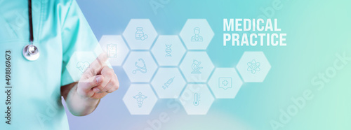 Medical Practice. Male doctor pointing finger at digital hologram made of icons. Text with medical term. Concept for digitalization in medicine photo