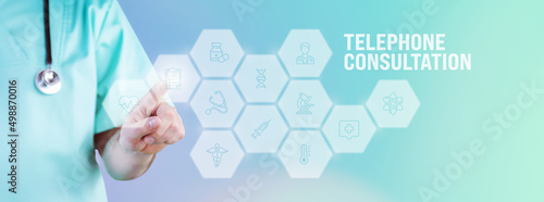 Telephone consultation. Male doctor pointing finger at digital hologram made of icons. Text with medical term. Concept for digitalization in medicine photo