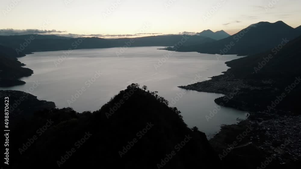 Sunrise over Indian nose, 3 Volcanoes and San Pedro la Laguna in Guatemala Sunrise over Indian nose, 3 Volcanoes and San Pedro la Laguna in Guatemala