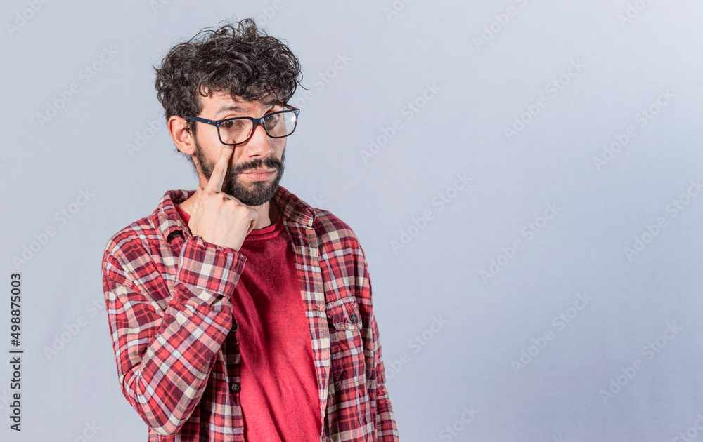 Distrustful man watching you, person with eyes on you, Distrustful guy with finger in the eye, distrustful man watching me Distrustful man watching you, person with eyes on you, Distrustful guy with finger in the eye, distrustful man watching me