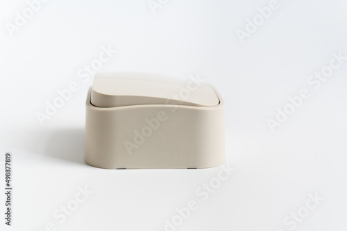 Two-key light switch on a white background. mechanical device for switching the lighting circuit, has two control keys. shop of electronic devices for the home.