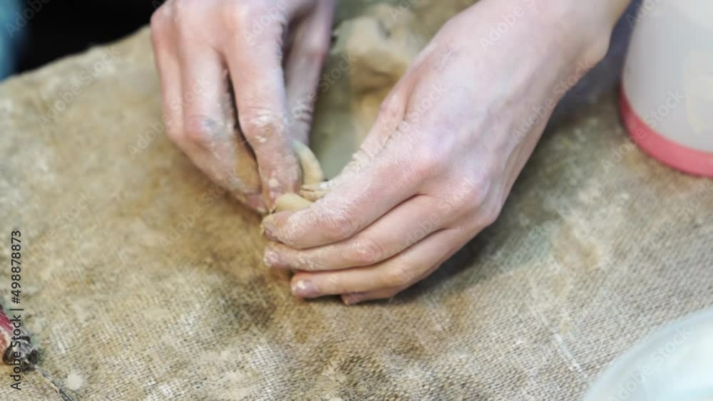 hands sculpt a figurine or sculpture of clay. developmental and creative activities with children. pottery workshop. a hobby for the whole family. hands sculpt a figurine or sculpture of clay. developmental and creative activities with children. pottery workshop. a hobby for the whole family.