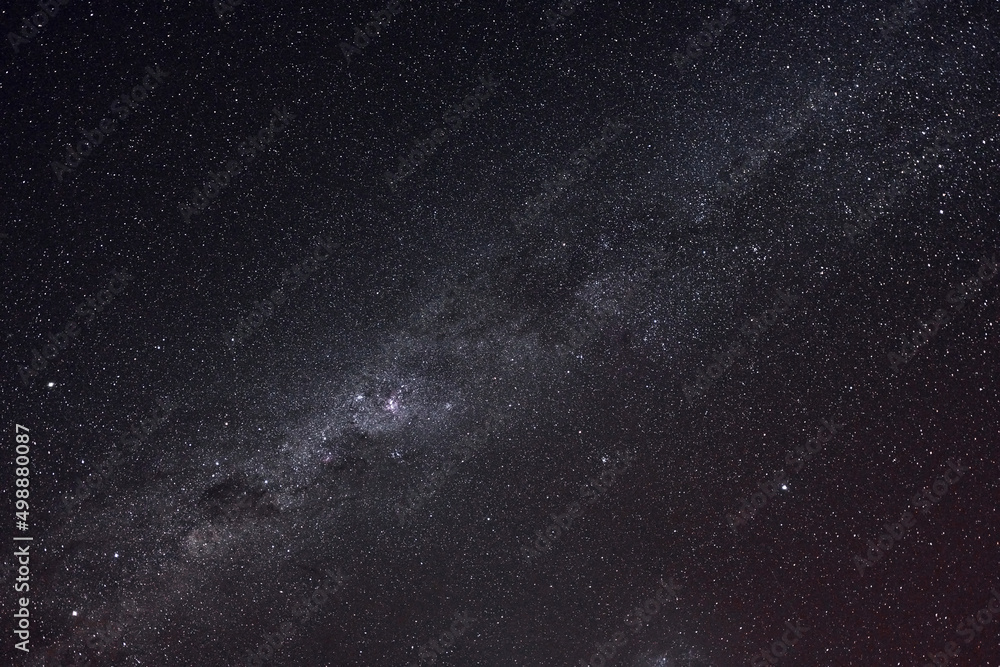 Fototapeta premium Majestic view of clear sky with stars and Milky Way in the space