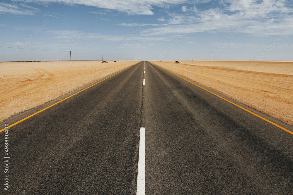 Straight surface. Majestic landscaped view of road in Africa, Namibia