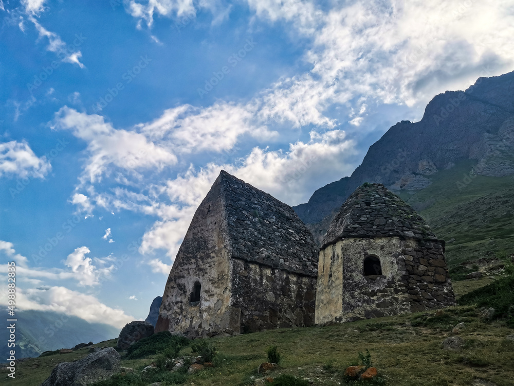 Eltyubyu is the city of the dead. Ancient Stone Crypts in Kabardino-Balkaria, Russia June 2021. Eltyubyu is the city of the dead. Ancient Stone Crypts in Kabardino-Balkaria, Russia June 2021.