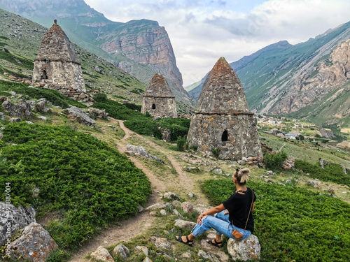 The girl in Eltyubyu is the city of the dead in Kabardino-Balkaria, Russia June 2021. photo