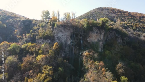 Aerial Autumn view of Polska Skakavitsa waterfall at Zemen Mountain, Kyustendil Region, Bulgaria photo