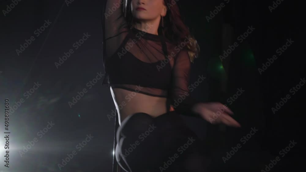 Pole dance. Young beautiful caucasian brunette woman dancer in studio. Pole dance. Young beautiful caucasian brunette woman dancer in studio.