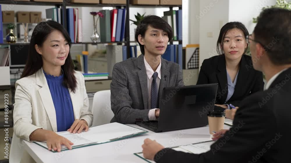 selective focus of group of startup businesspeople closing successful deal with handshake at business meeting. female colleagues clapping hands cheering for good result selective focus of group of startup businesspeople closing successful deal with handshake at business meeting. female colleagues clapping hands cheering for good result