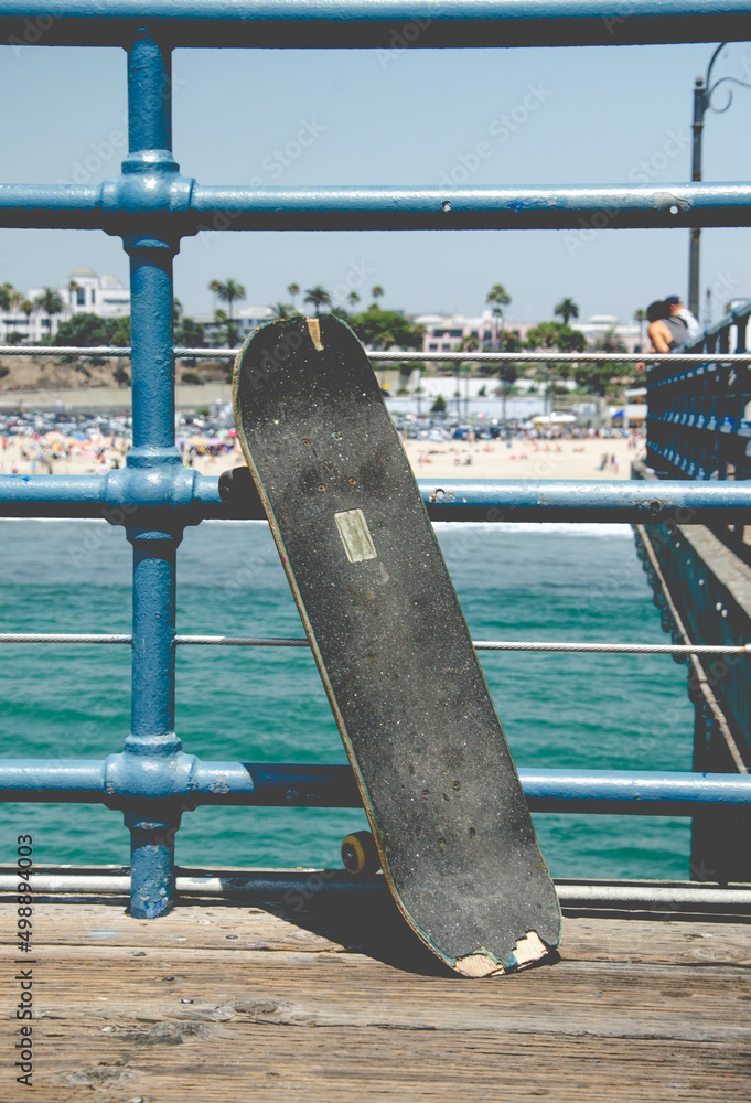 Naklejka premium Skateboard on Pier