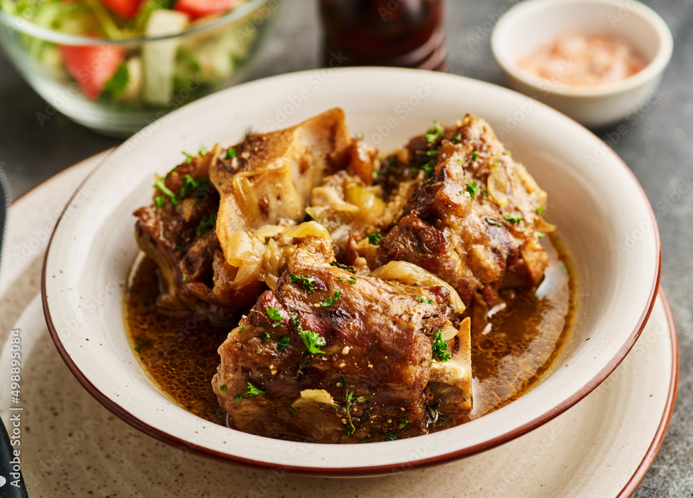 Oxtail braised with beer and soy sauce. Oxtail braised with beer and soy sauce.