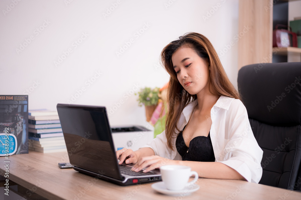 Bikini. Asian women wearing bikinis, posing in a studio room. Bikini. Asian women wearing bikinis, posing in a studio room.