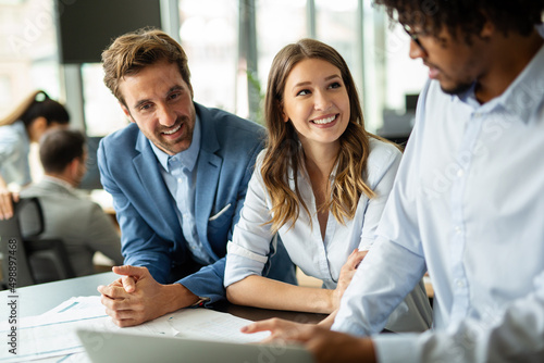 Wallpaper Mural Group of successful business people meeting in office, sharing their ideas. Torontodigital.ca