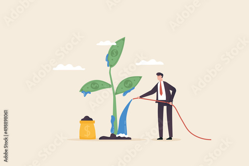 Financial growth or investment Increase profits and increase capital.Return on investment..Businessman watering big plants. business abstract gardening concept.