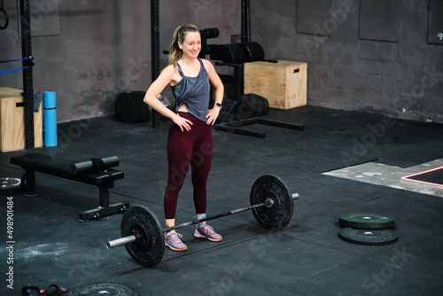 Young fitness woman training at the gym