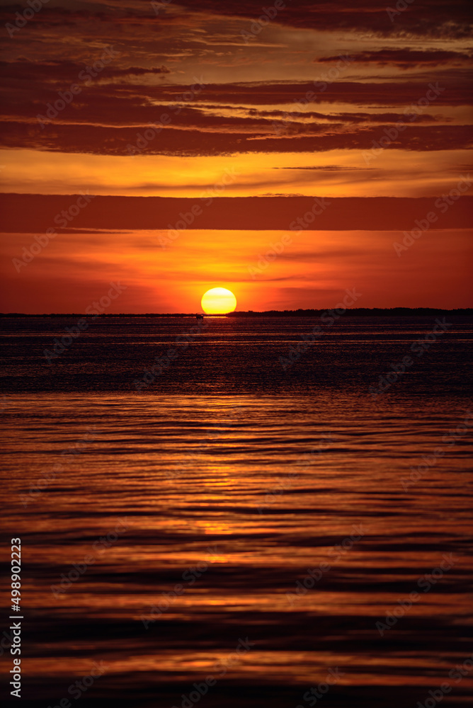 Gold sunrise sunset over the sea waves. Sunrise over the ocean.