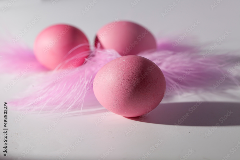 Easter eggs in a beautiful and simple composition with decorations Easter eggs in a beautiful and simple composition with decorations