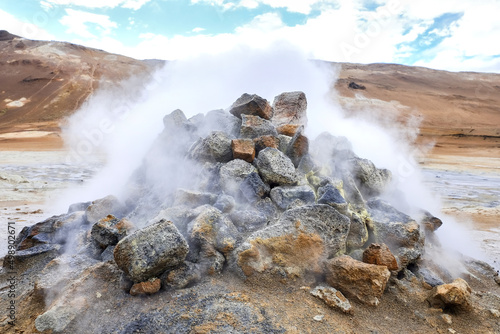 Steam cone in Hverir geothermal area, Iceland. Sulfur steam fumaroles