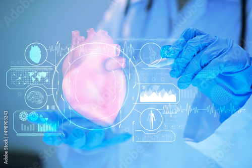 Fotografía Concepts of modern technologies of diagnostics of the heart, doctor touchstone virtual Heart in hand
