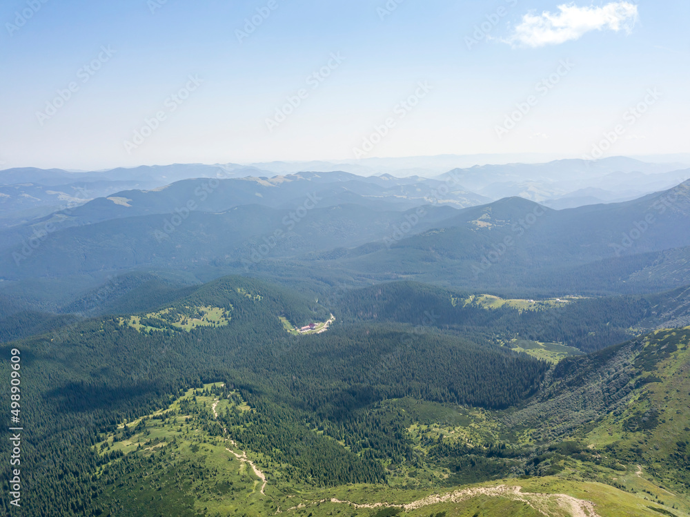 High mountains of the Ukrainian Carpathians in cloudy weather. Aerial drone view. High mountains of the Ukrainian Carpathians in cloudy weather. Aerial drone view.