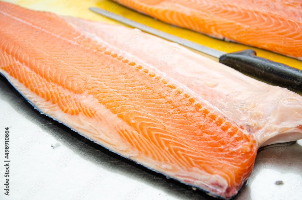 Red salmon fish. salmon fillet on the table. Healthy eating red salmon fish. Photo on fish production. Red salmon fish. salmon fillet on the table. Healthy eating red salmon fish. Photo on fish production.