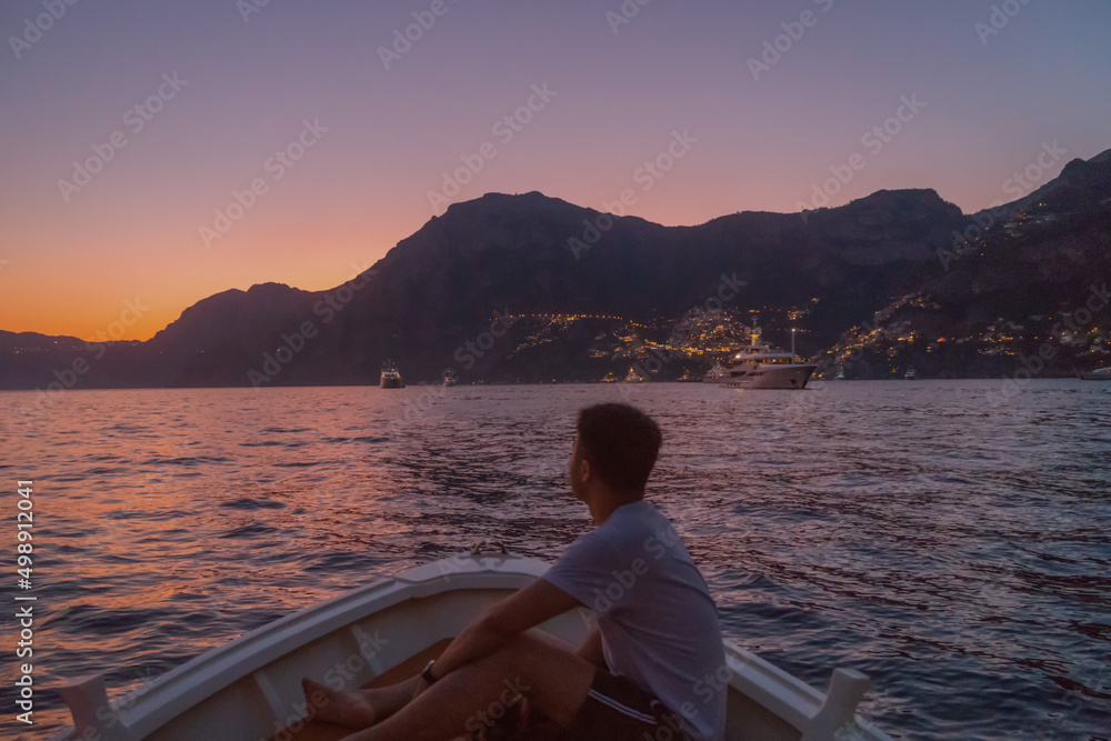 silhouette of a person on a boat
