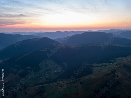 Ukrainian Carpathians mountains on a summer morning. Aerial drone view. © Sergey
