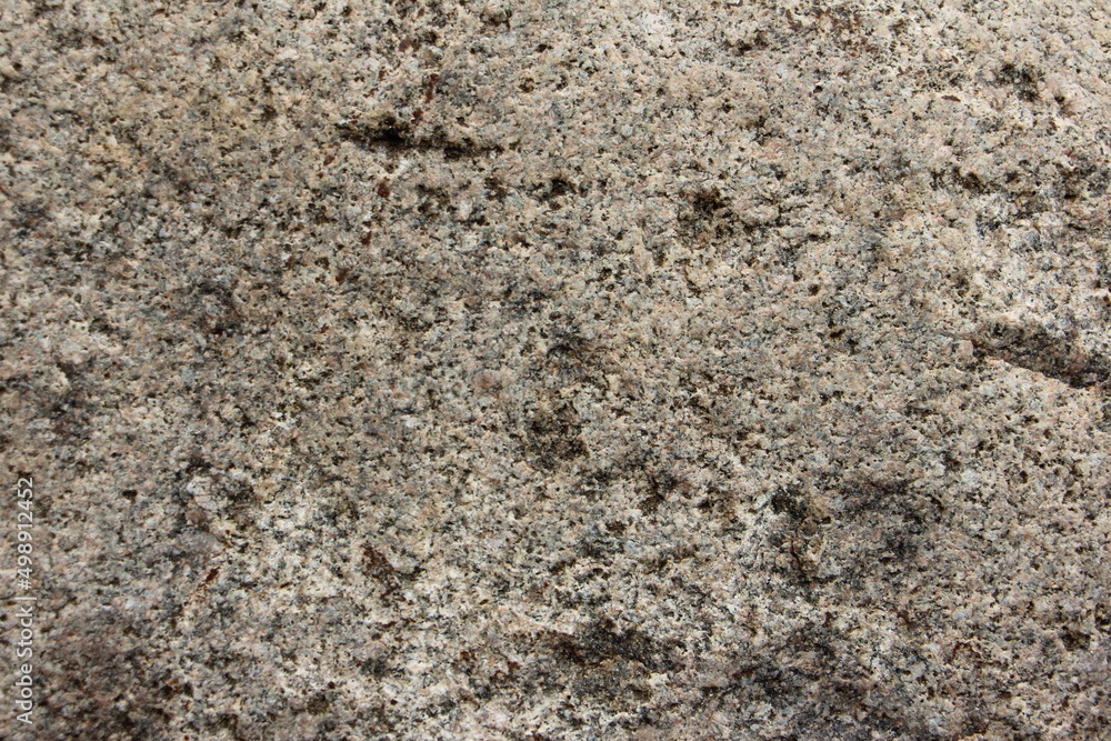 Rough gray stone or texture of mountains, background and space for copying text on the topic of geology and mountaineering. Rough gray stone or texture of mountains, background and space for copying text on the topic of geology and mountaineering.