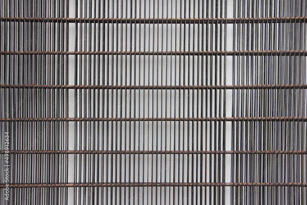 Outdoor refrigerator compressor. The back wall of the refrigerator is close-up. Outdoor refrigerator compressor. The back wall of the refrigerator is close-up.