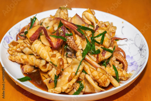 A delicious Chinese home-style dish, fried squid in sauce © Steve